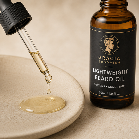 Close-up of lightweight pale golden Gracia Grooming beard oil and glass dropper