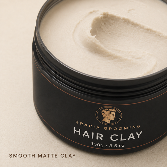 Close-up of smooth ivory Gracia Grooming hair clay with dense matte texture