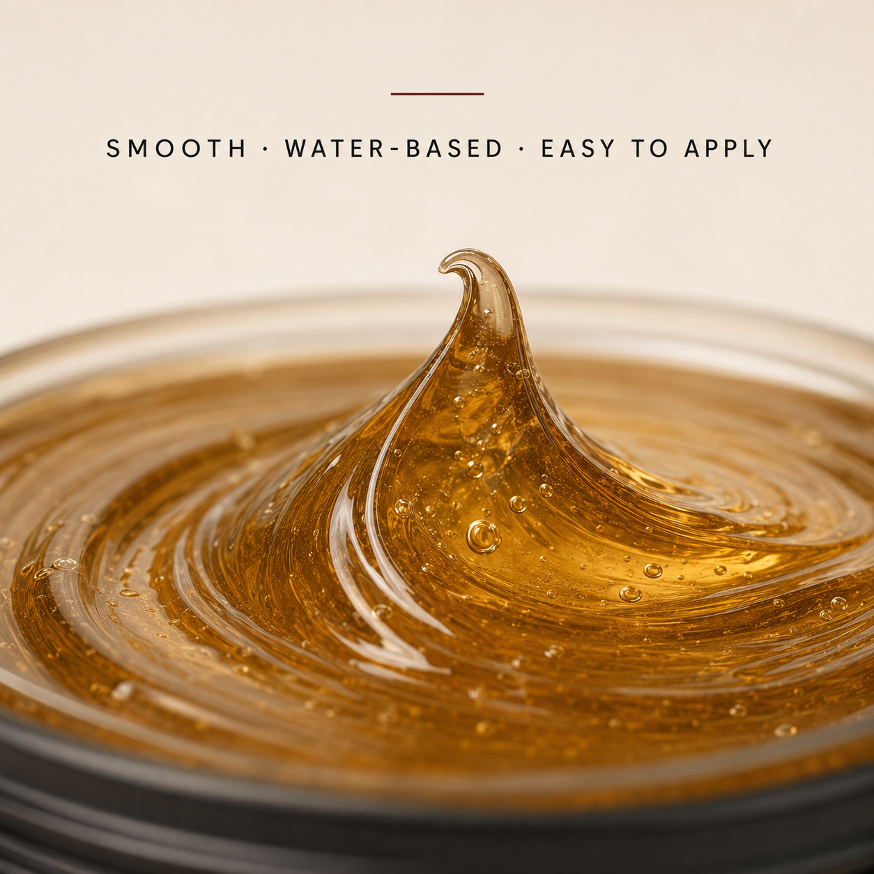Close-up of translucent amber Gracia Grooming high shine pomade texture